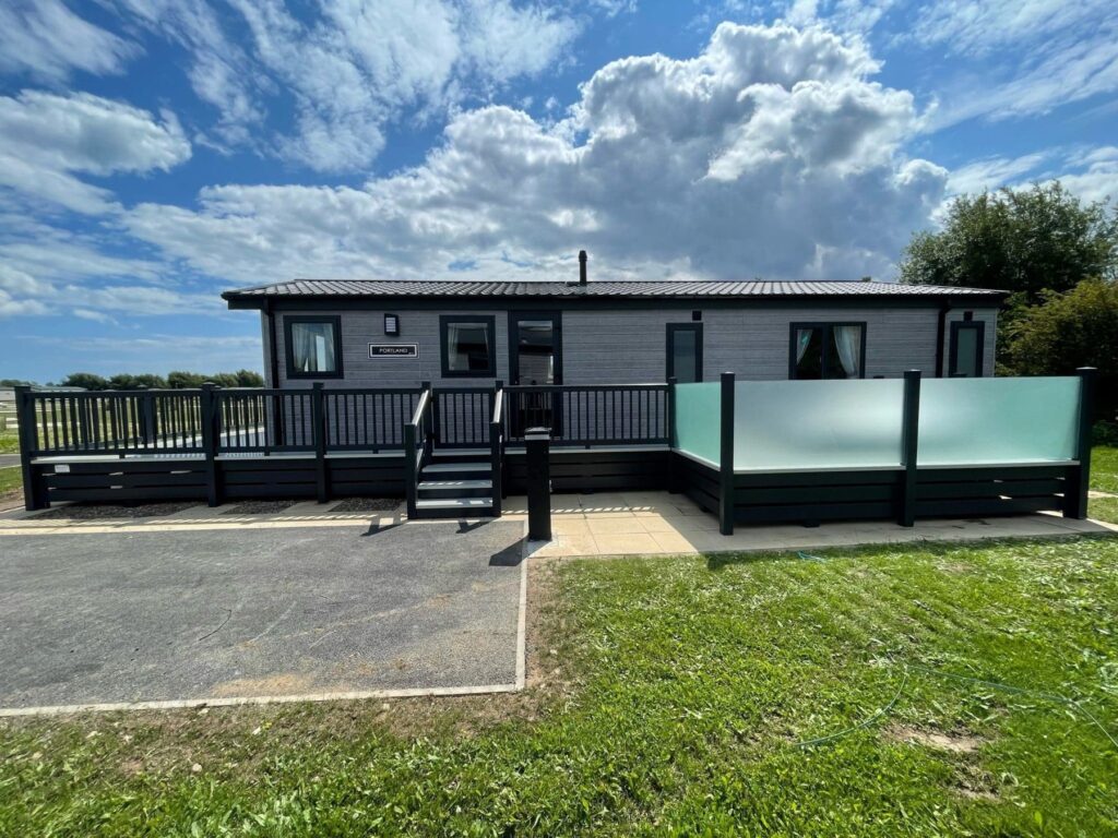Holiday home sundeck with frosted glass balustrade